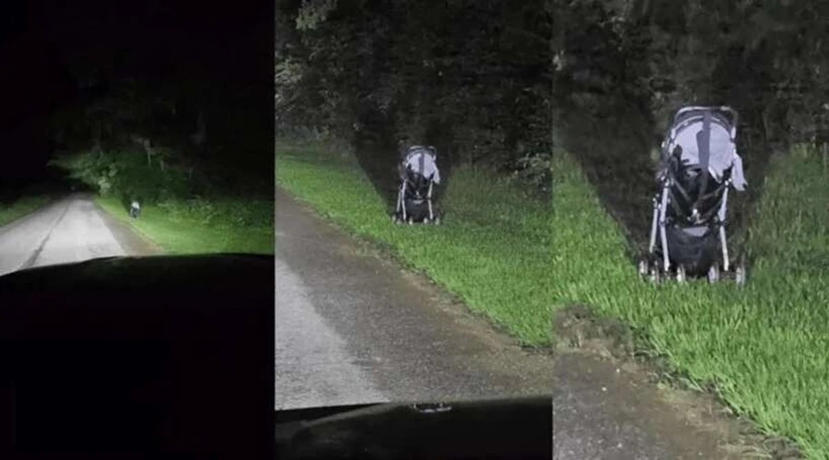 Paliktas vaikiškas vežimėlis naktį