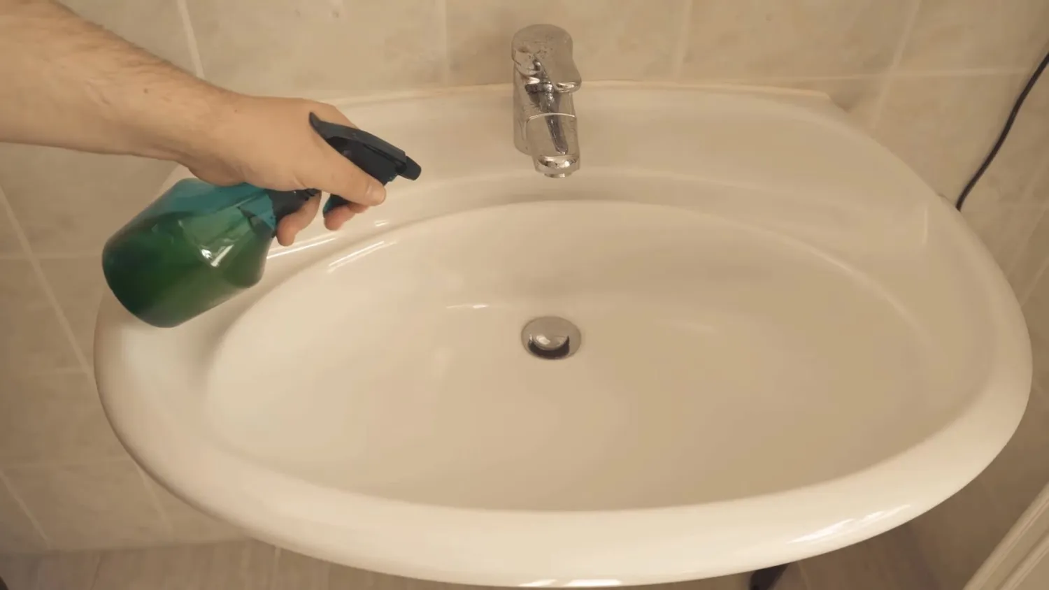 Purškiklis su apelsinų kvapu